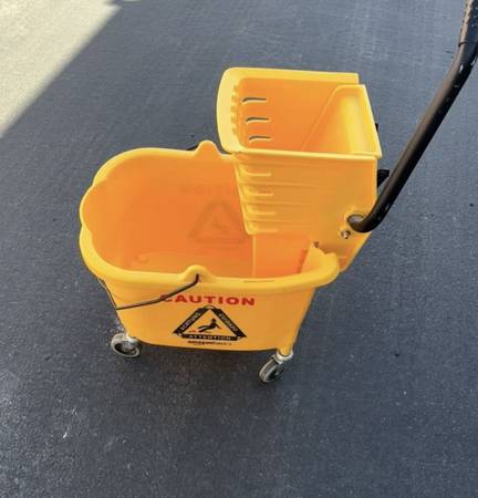 mop bucket 360 turn new - $50 (vegas)