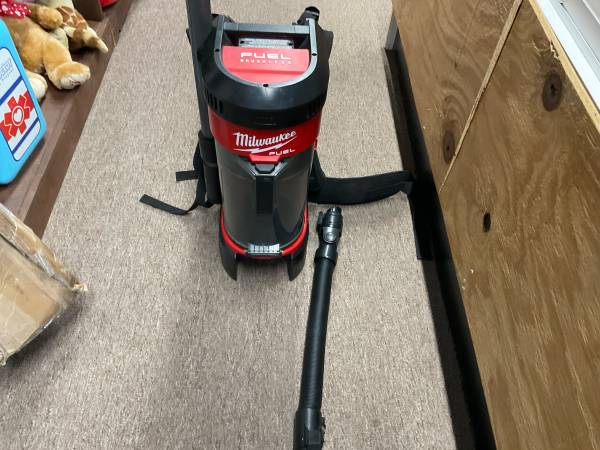 Milwakee backpack vacuum - $400 (Eureka)