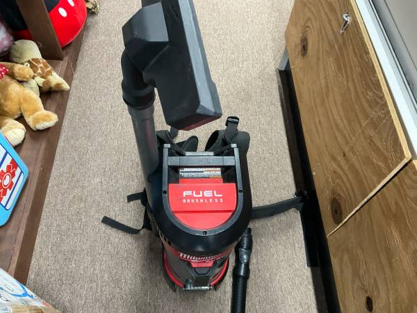 Milwakee backpack vacuum - $400 (Eureka)